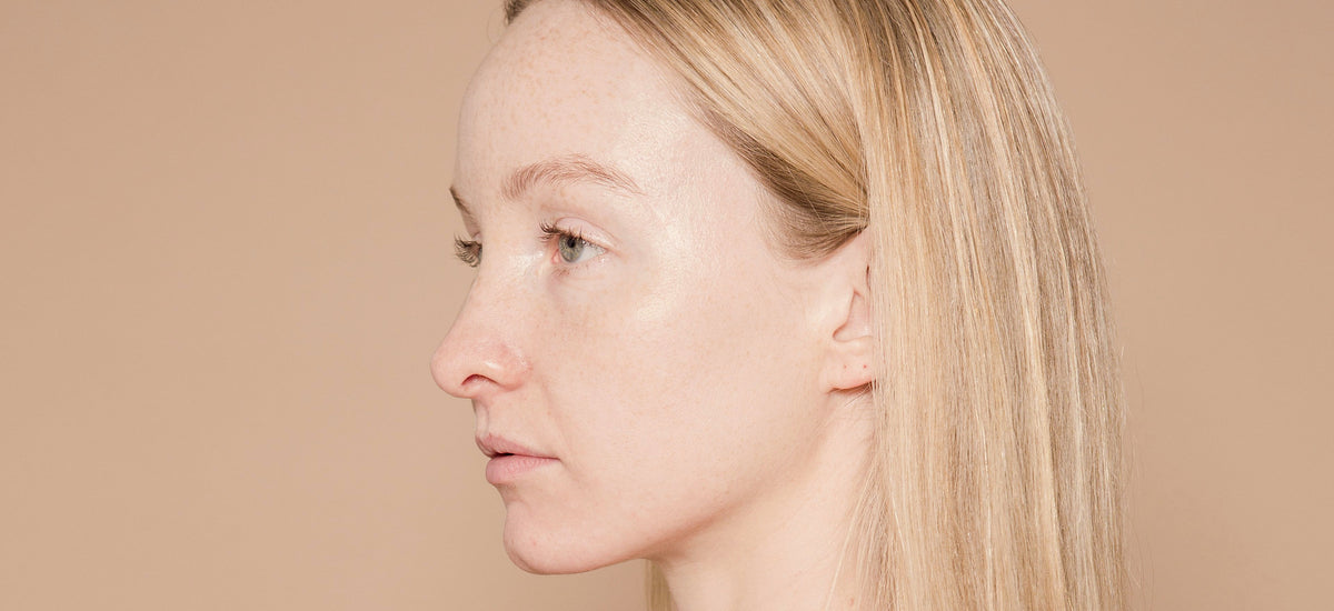 Profile of a woman with clear, hydrated skin