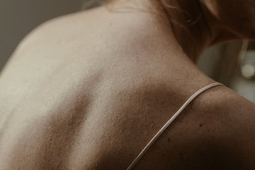 Close-up of a bare shoulder and neck