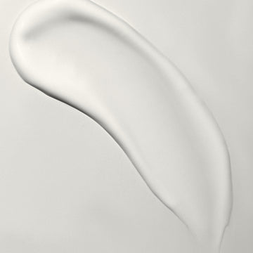 Smooth cream swatch on a pale background