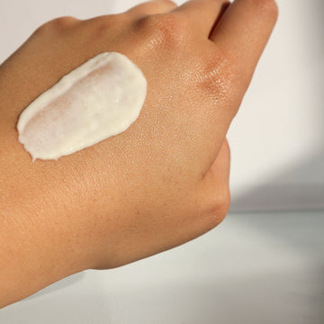 Cream swatch on the back of a hand
