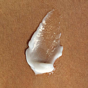 Gel texture on a warm brown surface