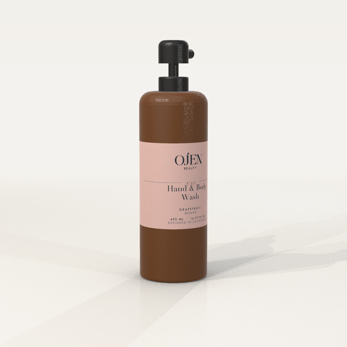 Ojen® N°111 Hand & Body Wash, Grapefruit (Amber Bottle) — angled view