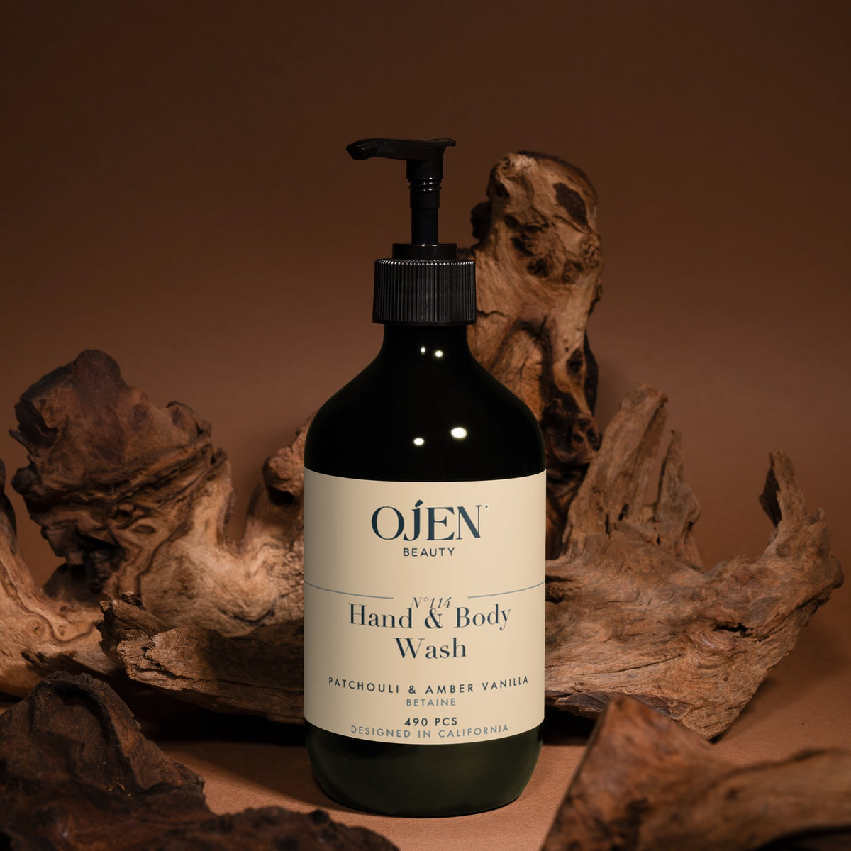 Ojen® N°114 Hand & Body Wash, Patchouli & Amber Vanilla (Green Bottle) — in situ
