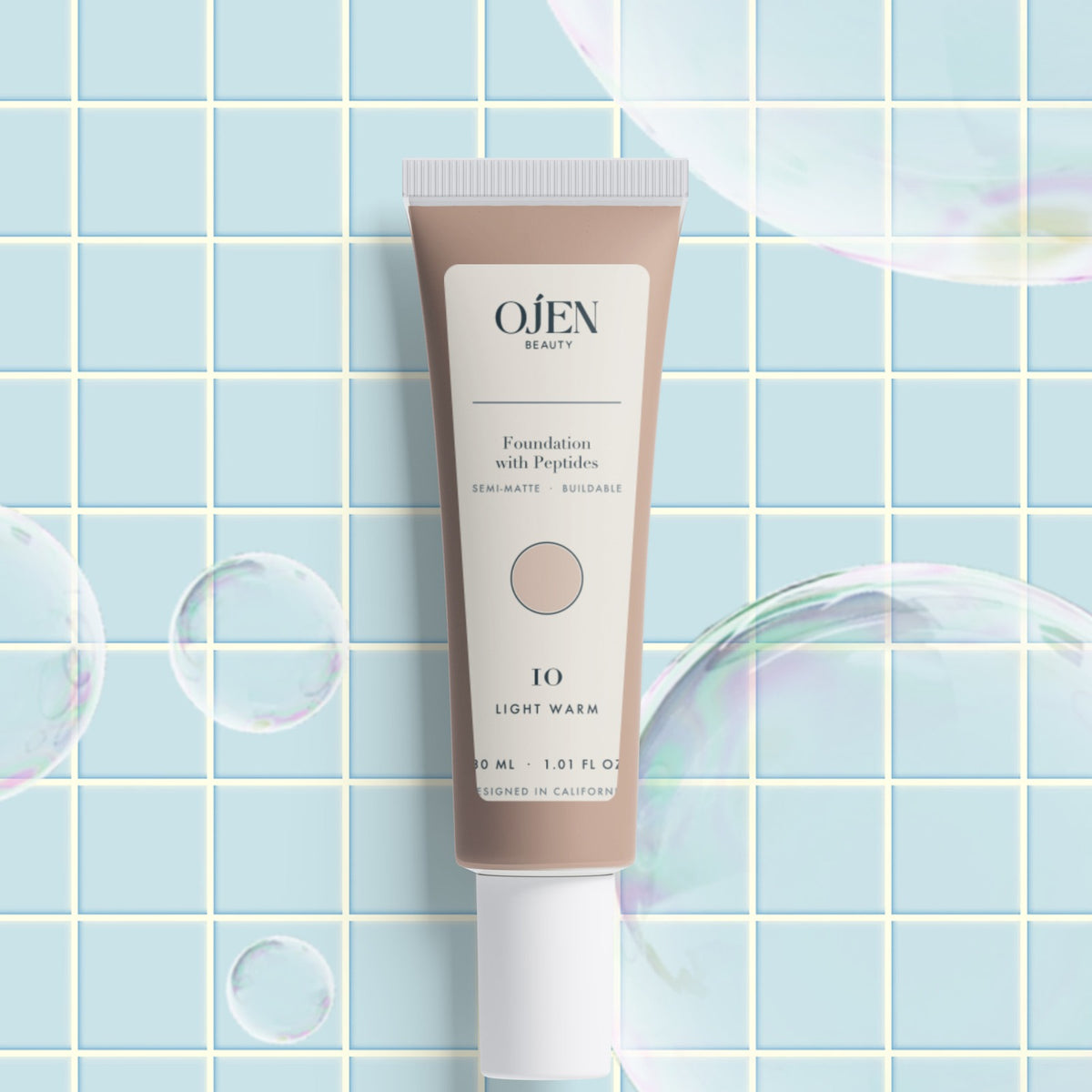 Ojen® N°90 Foundation with Peptides, 10 Light Warm — with its box